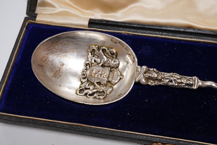 A cased Edwardian Dutch silver spoon, the bowl with applied Amsterdam City crest, the finial modelled as a yacht, import marks for Samuel Boyce Landeck, Chester, 1902, 21.7cm, 2.7oz.